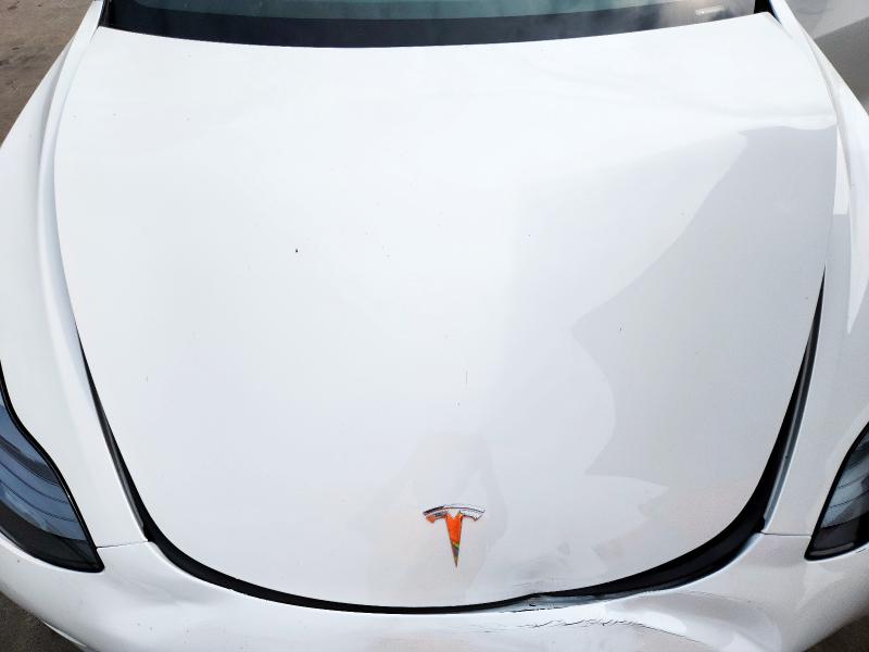 Photo 11 from auction – 2022 TESLA MODEL 3 with VIN 5YJ3E1EB5NF262619