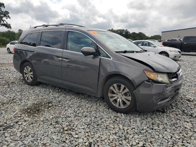 Photo 4 from auction – 2014 HONDA ODYSSEY with VIN 5FNRL5H61EB104994