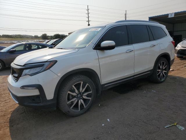 HONDA PILOT TOURING 2019 with VIN 5FNYF6H98KB034375 - Photo from auction