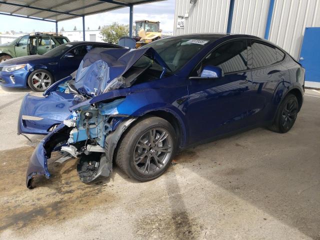 TESLA MODEL Y 2025 with VIN 7SAYGDED9SF246277 - Photo from auction