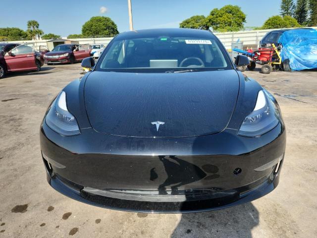 Photo 5 from auction – 2023 TESLA MODEL 3 with VIN 5YJ3E1EA3PF665797