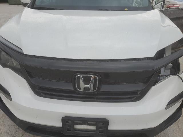 Photo 12 from auction – 2021 HONDA PILOT SE with VIN 5FNYF6H27MB089745