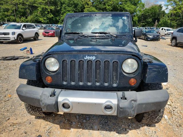 Photo 5 from auction – 2011 JEEP WRANGLER U with VIN 1J4BA5H15BL543100