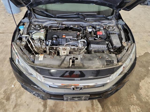 Photo 11 from auction – 2018 HONDA CIVIC LX with VIN 19XFC2F56JE036994