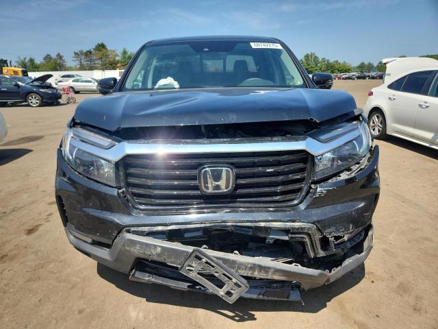 Photo 5 from auction – 2023 HONDA RIDGELINE with VIN 5FPYK3F77PB044745