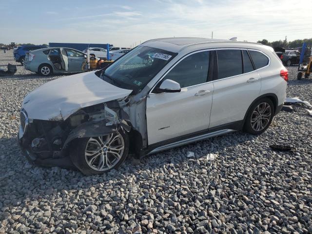 BMW X1 XDRIVE28I 2017 with VIN WBXHT3C32H5F79837 - Photo from auction
