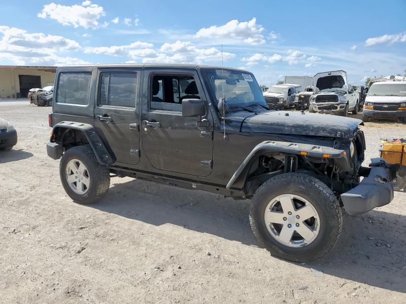Photo 4 from auction – 2011 JEEP WRANGLER U with VIN 1J4BA3H15BL627700