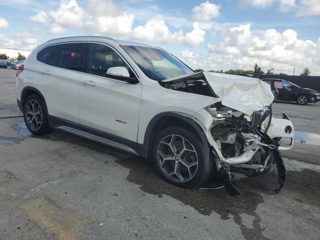 Photo 4 from auction – 2016 BMW X1 XDRIVE2 with VIN WBXHT3C32G5E49989