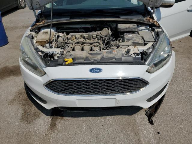 Photo 11 from auction – 2016 FORD FOCUS SE with VIN 1FADP3K22GL259004