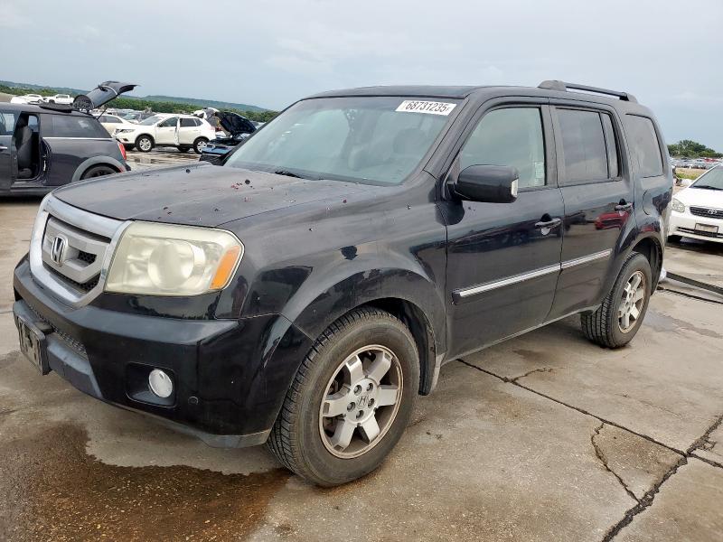 HONDA PILOT TOUR 2010 with VIN 5FNYF4H98AB014372 - Photo from auction