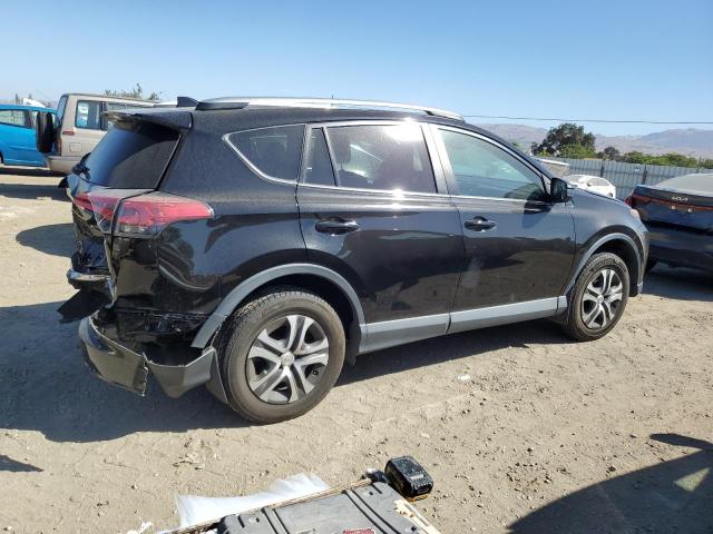 Photo 3 from auction – 2018 TOYOTA RAV4 LE with VIN 2T3BFREV4JW850890