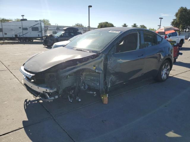 TESLA MODEL Y 2024 with VIN 7SAYGDEE7RF985859 - Photo from auction