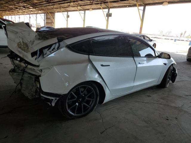 Photo 3 from auction – 2021 TESLA MODEL 3 with VIN 5YJ3E1EA7MF996572