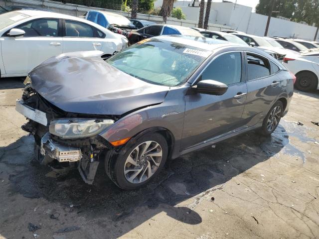 HONDA CIVIC EX 2016 with VIN 2HGFC2F74GH548415 - Photo from auction