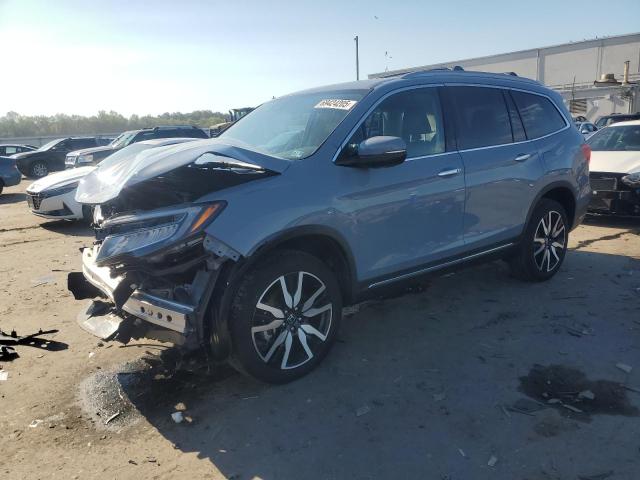 HONDA PILOT TOUR 2022 with VIN 5FNYF6H63NB077922 - Photo from auction