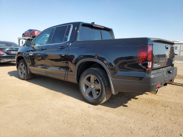 Photo 2 from auction – 2023 HONDA RIDGELINE with VIN 5FPYK3F52PB015913