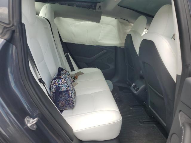 Photo 10 from auction – 2023 TESLA MODEL 3 with VIN 5YJ3E1EA8PF658330