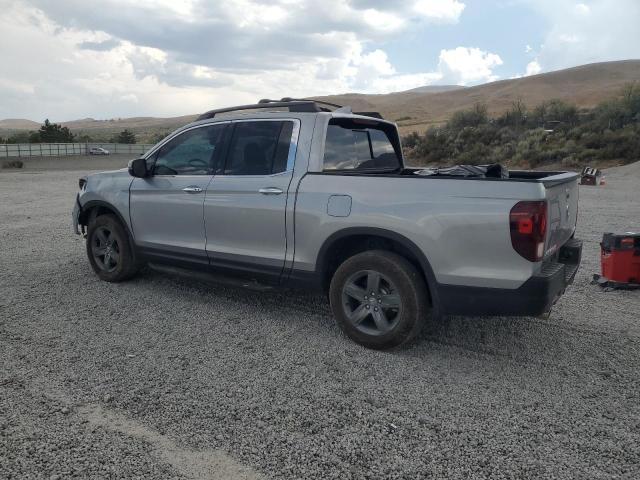 Photo 2 from auction – 2023 HONDA RIDGELINE with VIN 5FPYK3F75PB012537