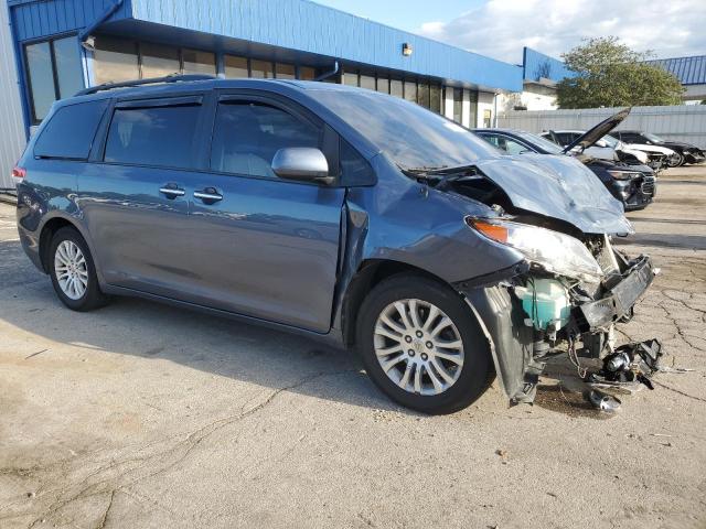 Photo 4 from auction – 2014 TOYOTA SIENNA XLE with VIN 5TDYK3DC5ES464246