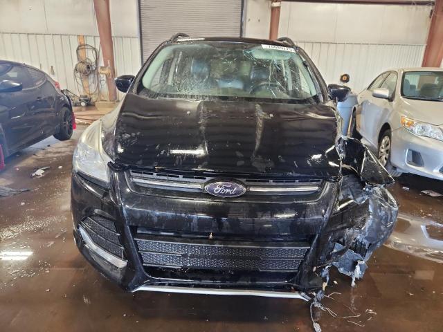 Photo 5 from auction – 2016 FORD ESCAPE SE with VIN 1FMCU9G96GUB76687