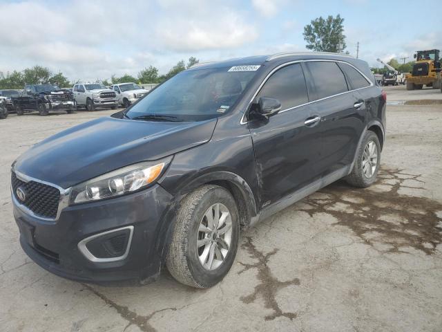 KIA SORENTO LX 2018 with VIN 5XYPGDA35JG429236 - Photo from auction