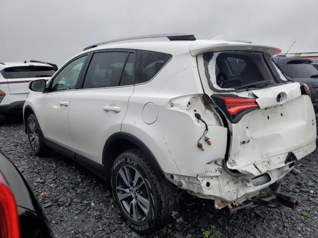Photo 2 from auction – 2018 TOYOTA RAV4 LE with VIN 2T3BFREVXJW822060
