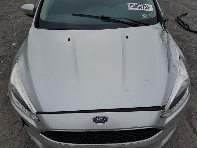 Photo 11 from auction – 2018 FORD FOCUS SE with VIN 1FADP3F27JL271411