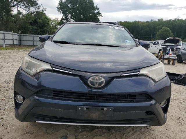 Photo 5 from auction – 2017 TOYOTA RAV4 XLE with VIN JTMRFREV4HJ143599