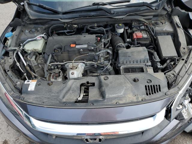 Photo 11 from auction – 2018 HONDA CIVIC LX with VIN 2HGFC2F50JH555643