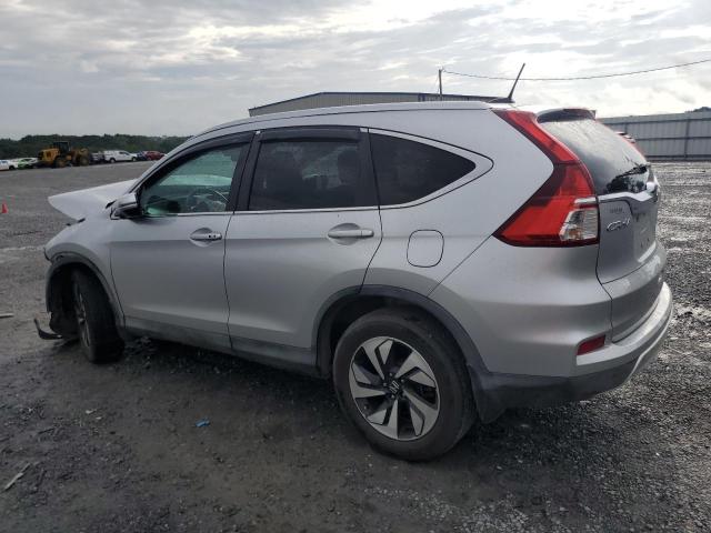 Photo 2 from auction – 2016 HONDA CR-V TOURING with VIN 5J6RM3H94GL006676