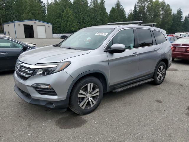 HONDA PILOT EX 2017 with VIN 5FNYF5H3XHB043027 - Photo from auction
