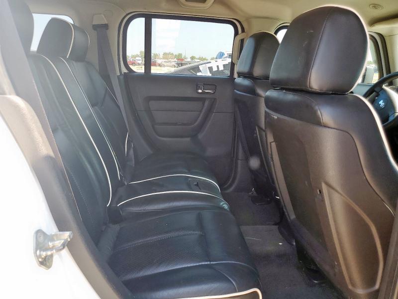 Photo 11 from auction – 2006 HUMMER H3 with VIN 5GTDN136668323920