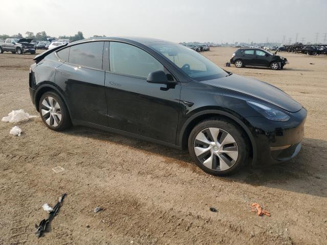 Photo 4 from auction – 2023 TESLA MODEL Y with VIN 7SAYGAEE9PF834582
