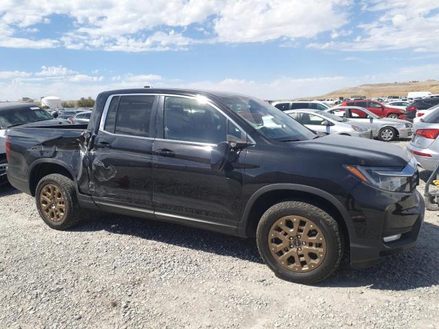 Photo 4 from auction – 2023 HONDA RIDGELINE with VIN 5FPYK3F53PB053814