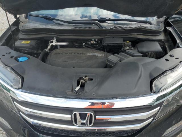 Photo 12 from auction – 2016 HONDA PILOT with VIN 5FNYF5H5XGB057087