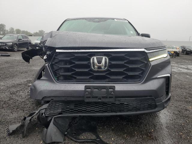 Photo 5 from auction – 2023 HONDA PILOT LX with VIN 5FNYG1H20PB024353