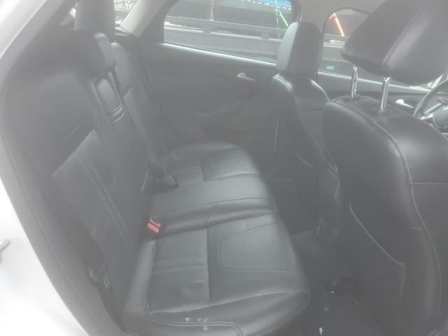 Photo 10 from auction – 2013 FORD FOCUS TITANIUM with VIN 1FADP3N27DL120834
