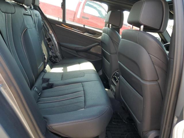 Photo 10 from auction – 2021 BMW M550XI with VIN WBA13BK00MCF41686