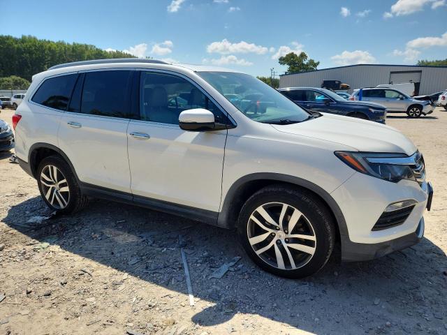 Photo 4 from auction – 2016 HONDA PILOT ELITE with VIN 5FNYF6H05GB106559