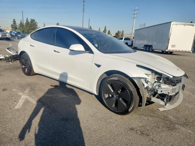 Photo 4 from auction – 2021 TESLA MODEL 3 with VIN 5YJ3E1EAXMF063555
