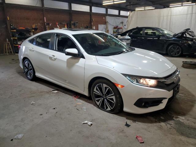 Photo 4 from auction – 2016 HONDA CIVIC EXL with VIN 2HGFC1F7XGH642275
