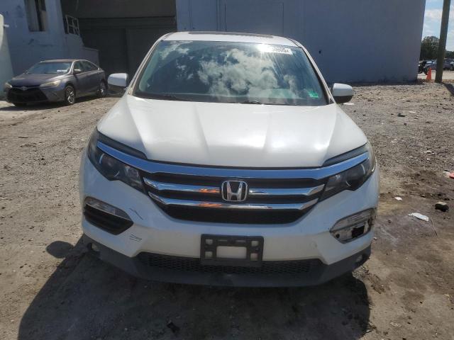 Photo 5 from auction – 2016 HONDA PILOT EXL with VIN 5FNYF6H5XGB051490