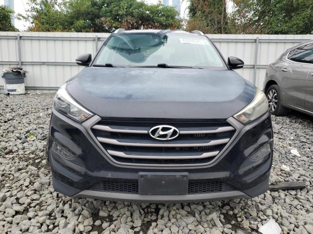 Photo 5 from auction – 2016 HYUNDAI TUCSON LIM with VIN KM8J33A21GU039126