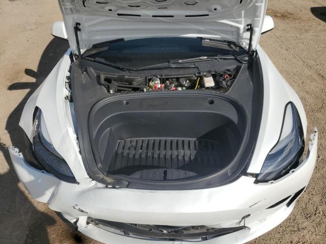 Photo 11 from auction – 2022 TESLA MODEL 3 with VIN 5YJ3E1EB1NF323285