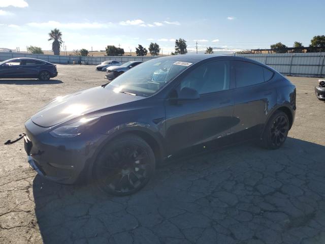 TESLA MODEL Y 2024 with VIN 7SAYGDEE1RF025808 - Photo from auction