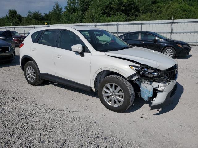 Photo 4 from auction – 2014 MAZDA CX-5 SPORT with VIN JM3KE2BE1E0422131