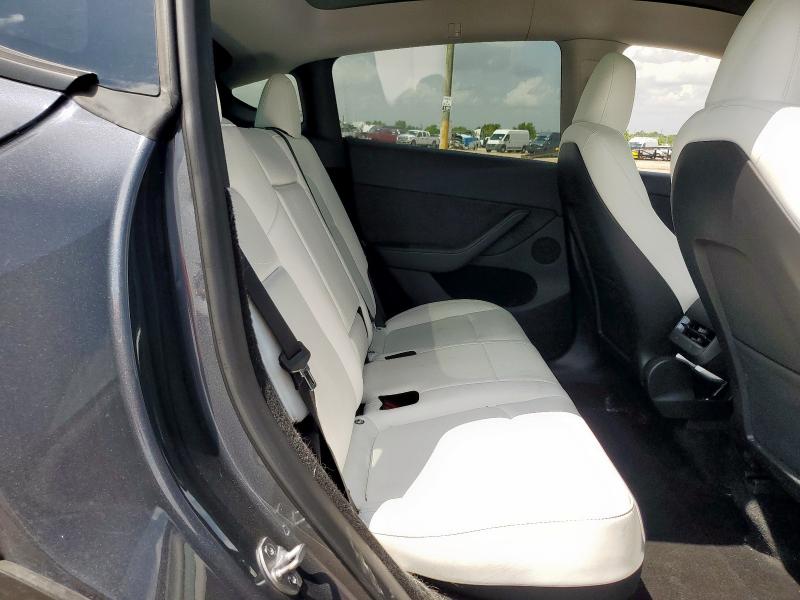 Photo 11 from auction – 2023 TESLA MODEL Y with VIN 7SAYGDEE6PA091667
