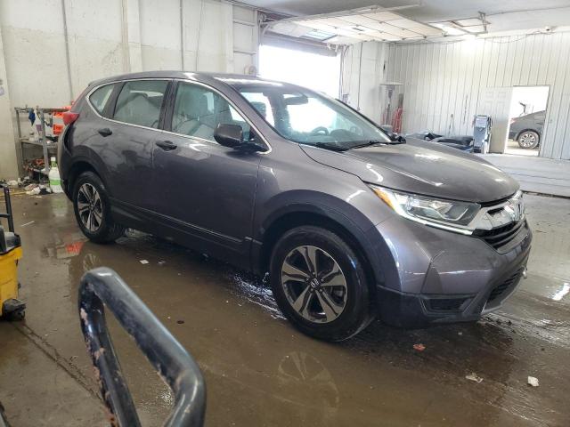 Photo 4 from auction – 2017 HONDA CR-V LX with VIN 7FARW5H34HE008606