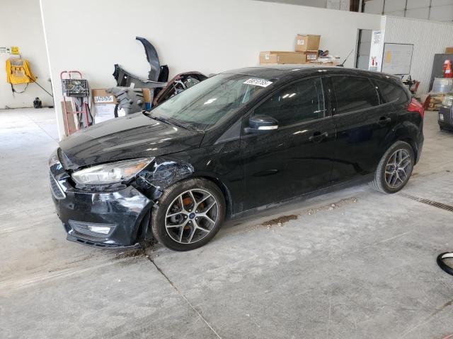 FORD FOCUS 2018 with VIN 1FADP3M21JL278454 - Photo from auction