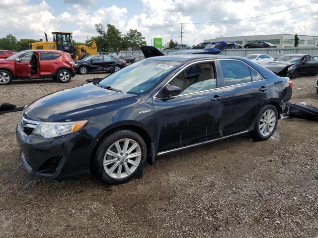 TOYOTA CAMRY HYBR 2012 with VIN 4T1BD1FK9CU024477 - Photo from auction